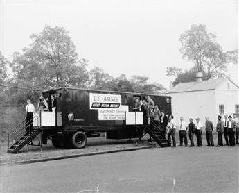 (U.S. ARMY ELECTRONICS FAIR) A group of approximately 105 photographs documenting the booths and attendees of the 1967 U.S. Army Electr